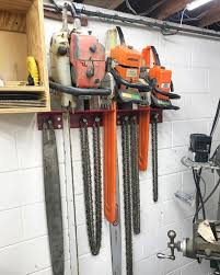 Matt Cremona On Instagram Chainsaw Storage Rack Is Done Video On How I Made It Is Up On My Youtub In 2020 Garage Organisation Storage Shed Organization Storage Rack