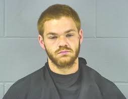 Greenfield man faces felony gun and escape charges