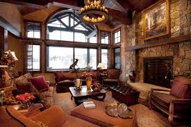 If you're able to, keep or install exposed beams and wood panelling, but make other modern choices. Modern Rustic Living Room Klassisch Wohnbereich Denver Von Design One Interiors
