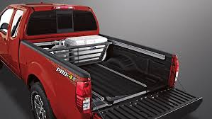 Nissan Frontier Pro 4x King Cab Shown In Lava Red With Sliding Bed Divider 2014 Nissan Frontier Nissan Nissan Navara D40