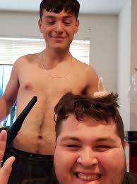 The boys watching the vacuum from a safe spot....lol