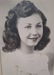 Can someone edit my grandma's photo to have dark brown hair and green eyes?