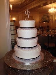 A 4 Tiered Vanilla Cake Filled With Decadent Chocolate Mousse Frosted With Our Traditional Buttercream Del Chocolate Mousse Frosting Decadent Chocolate Cake