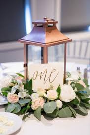 20 Rustic Lantern Wedding Decoration Ideas To Light Up Your Day Page 2 Of 2 Lantern Centerpiece Wedding Gold Wedding Centerpieces Flower Centerpieces Wedding