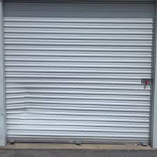 Before and after of garage door replacements or panel replacements. Commercial Panel Replacement Dortex Garage Doors