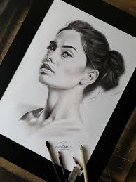 My latest portrait drawing in charcoal and graphite pencils 50x50cm.