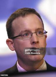 Adam Rowley an analyst at Macquarie Bank Limited speaks at the London...  News Photo