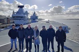 Her flight deck is 70 metres wide and 280 metres long she will have a crew complement (minimum crew) of around 700, increasing to around 1,600 with aircraft onboard. All Aboard Aerospace Engineers Visit Hms Prince Of Wales News University Of Liverpool