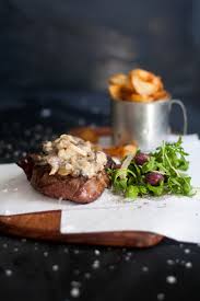 With mushrooms and egg noodles. Rib Eye Steak With Green Peppercorn Mushroom Sauce Recipe Stuffed Mushrooms Dude Food Mushroom Sauce