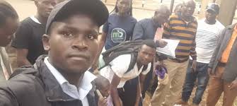 Son attends late mp burial