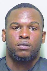 Pot, weapons found in 'trap house' arrest