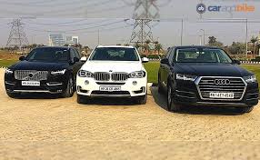 Compare bmw x5 xdrive30d sportx vs volvo xc90 d5 momentum on the basis of price, features and specifications. Comparison Review Audi Q7 Vs Bmw X5 Vs Volvo Xc90 Carandbike