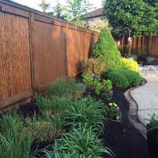 Bamboo privacy screens can give a more natural and zen look to your patio or backyard deck this diy privacy fence idea for backyard is similar to the number 21. Top 50 Best Bamboo Fence Ideas Backyard Privacy Designs