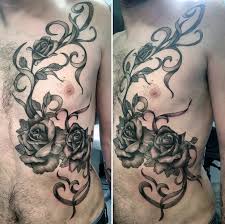 This black and white tattoo that has vines as well as smaller roses. Top 81 Best Rose Vine Tattoo Ideas 2021 Inspiration Guide
