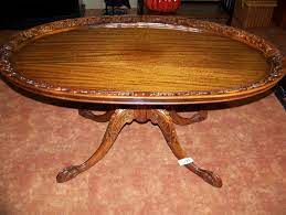 The range of distinct ball and claw tables — often made from wood, mahogany and walnut — can elevate any home. Antique Coffee Table With Claw Feet