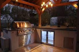 This protection means that your furniture can stay dry during those unexpected summer downpours, and you can have more control over light and exterior temperature. Creation Of An Oak Framed Timber Building Over An Outdoor Kitchen