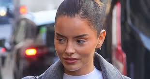 Maura Higgins looks tense as she's seen for the first time since Pete Wicks  'cheating' jibe