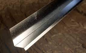 I have used an aluminum flashing held down with galvanized screws through metal roofing. Door Window Flashing Flashings Galvanized City Sheet Metal