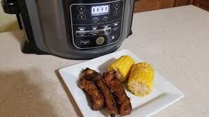 The ninja foodi is a pressure cooker and air fryer that can also be used as an oven, steamer, roaster, dehydrator, and slow cooker. Ninja Foodi Slow Cooker Bbq Pork Ribs And Juicy Sweet Garlic Foil Corn Youtube