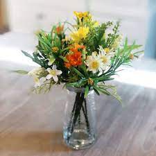 None artificial plants & flowers artificial plants candle shop air freshners candle gift sets jar candles pillar candles reed diffusers scented oils tealight candles tin candles votive candles wax melts festive accessories valentine's garden accessories garden figurines & statues garden lights. Artificial Flowers In A Vase Arrangement Wildflowers And Yellow Daisies
