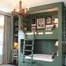 We made up for it with a large walk in closet and a loft bed. 8 Bunk Bed Shelf Ideas For Top Bunk Storage Space Apartment Therapy