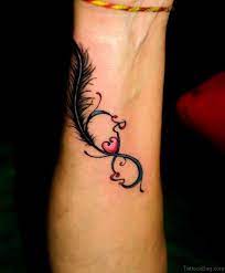 The font of the initial is very simple but looks perfect with the elaborated wings. 60 Pleasing Initials Tattoos On Wrist