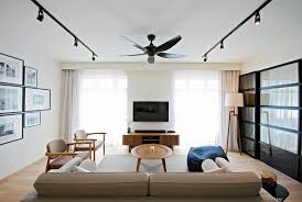 Go futuristic, with colourful clocks that shine metallic. Recommended Home Designer Living Room Design Singapore