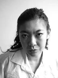 Author photo for my hybrid poetry book "Other Lives" Dropping it