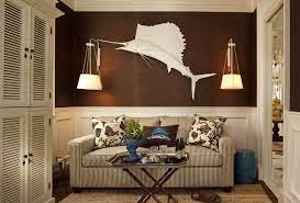 Matte White Paint Helps A Taxidermy Sailfish To Become A Focal Point On A Wall Covered In Chocolatecolored Grass Cloth The Coastal Style Home Decor Family Room