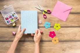 How to make a card open a page in canva open up canva and log in or sign up for a new account using your email, google or facebook profile. Free Photo Close Up Of Hand Making Greeting Card On Wooden Plank