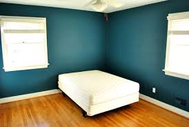 Find or make some matching teal curtains for your windows. Bold Teal Walls A Handy How We Cut In Video Young House Love