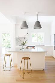 Check spelling or type a new query. White And Gray Kitchen With Backless Gold Counter Stools Accented With Cork Seats Modern Kitchen