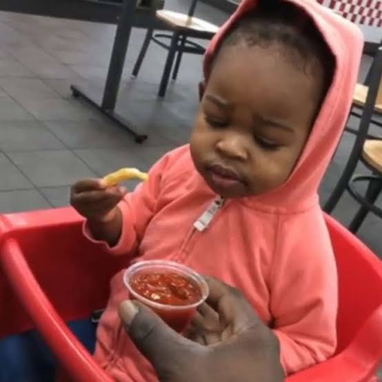 Skeptical toddler dipping french fry in ketchup for the 1st time is all of us - ABC News
