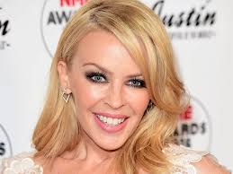 Kylie Minogue says she wonders what having kids would have been like but  accepts she will not be a mother