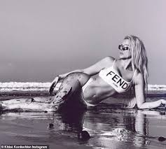 Out of all the kardashians, khloe wasn't tired of filming their series, but her sisters were ready for many people believe that khloe kardashian is a bad role model to young children because i'd the. Khloe Kardashian Proves She Has Her Abs Back While Modeling A Fendi Bikini On The Beach Daily Mail Online