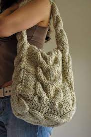 This spacious knit sack from patons is great for your everyday book bag or shopping tote. Soul Of A Vagabond Classic Cable Knitted Shoulder Bag Flickr Photo Sharing Knitted Bags Hand Knitting Knitting