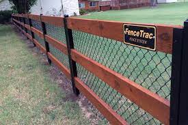 This modern dark, brick fencing mixed with a detailed iron gate gives a traditional look and feel. Modern Fence Systems Metal Frame Any Infill Fencetrac By Perimtec