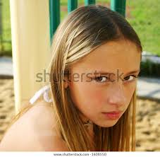 Kid On Playground Glaring Stock Photo 1608550