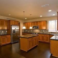 We love restoration hardware floors, but did not have reclaimed wood in hand so we recreated it. Wood Flooring With Oak Cabinets Wood Flooring Design