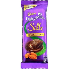 Blonde glamour model adjusting stockings. Dairy Milk Silk Chocolate Rajasthan Gift
