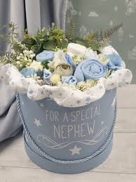 Soft rattles and stuffed animals make for gifts the little one can cuddle with. Baby Clothes Bouquet For Nephew Baby Shower Gift New Nephew Gift Baby Boy Gift Baby Bouquet Newborn Baby Gifts Nephew Gifts