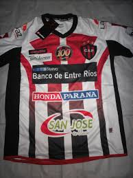 Grupo de personas que realizan funciones de. Patronato Away Football Shirt 2014 2015