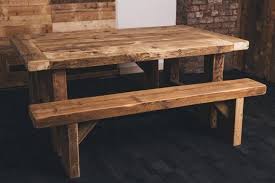 The massive barn wood timbers used for the table base are solid wood salvag. Rustic Style Dining Table And Two Benches Any Size Quality Reclaimed Timber Solid Wood Dining Table Great Fall Sale Dining Table Table Solid Wood Dining Table