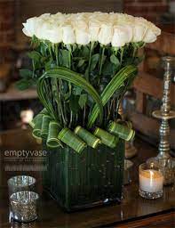 Local towns near west hollywood, ca. Elegance Simplicity And Beauty Of White Love The Leaf Rolls Modern Flower Arrangements Unique Flower Arrangements Beautiful Flower Arrangements