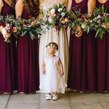 Little Cutie And Her Bridesmaids Dressed In Merlot Mumuweddings Merlot Bridesmaid Dresses Merlot Wedding Colors Wedding Dresses Simple