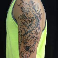Koi fish tattoos are very popular, and many people place them on the shoulder or the arm. Tattoos For Men Coy Fishamazing Koi Fish Tattoo On Arm For Men Cool Tattoo Designs Ibhpfr3y Jpg 612 612 Tattoos For Guys Arm Tattoos For Guys Tattoos