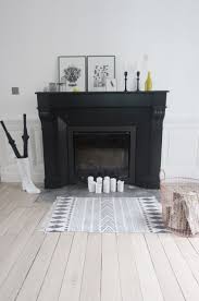 Black And White Fireplace Surround Cheminee Peinte Noire Entrelesmurs Com Peindre Une Cheminee Vieille Cheminee Cheminee Noire