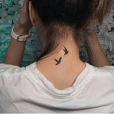 Small Bird Neck Tattoos For Guys To Flying Birds Tattoo Inked On The Back Of The Neck Tattoosonneck Neck Tattoos Women Bird Tattoo Neck Back Of Neck Tattoo