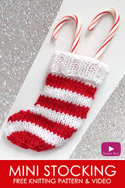 If you've never tried fair isle style knitting, with lots of colour work and tiny images all across the this pattern shows you how to knit little christmas lights in all different colours that stand out from the background of the stocking in an adorable way. Mini Christmas Stocking Knitting Pattern Studio Knit