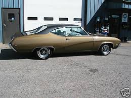 Image result for Trumpet Gold 1969 Buick